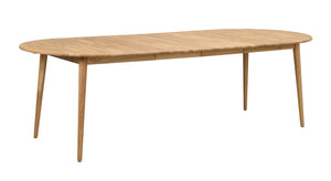 Oval matbord i ljust trä med utdragsskiva och fyra spetsiga ben i skandinavisk design