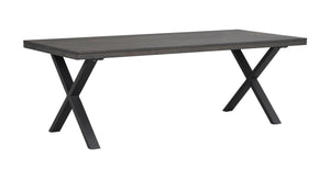 Matbord med grå bordsskiva och svarta korslagda ben i modern design