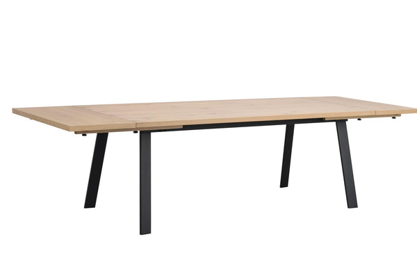 Matbord i ljust trä med svarta metallben och utdragbar skiva i modern skandinavisk design