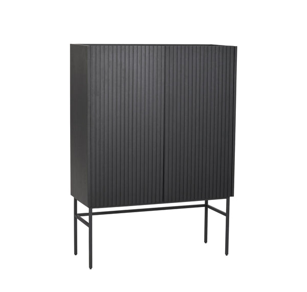 Svart skåp med räfflad front på smala metallben i modern skandinavisk design