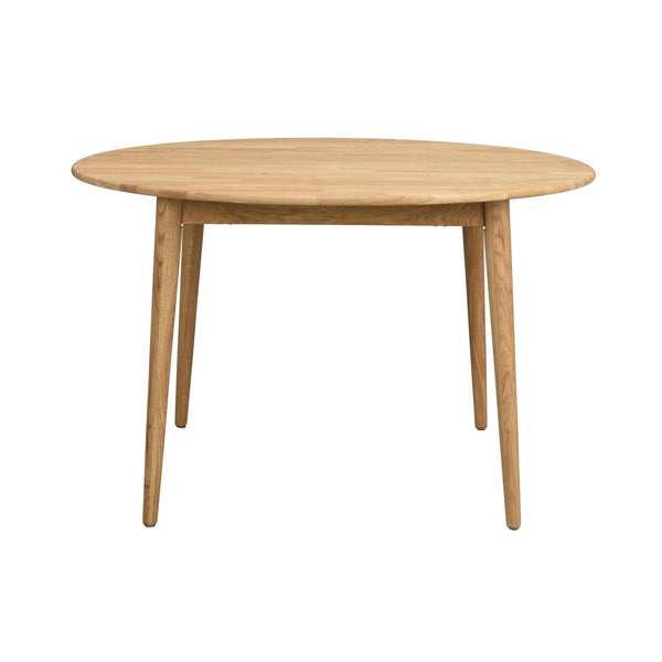 Runt matbord i ljust trä med fyra vinklade ben och enkel skandinavisk design
