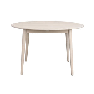 Runt matbord i ljust trä med fyra ben i skandinavisk design