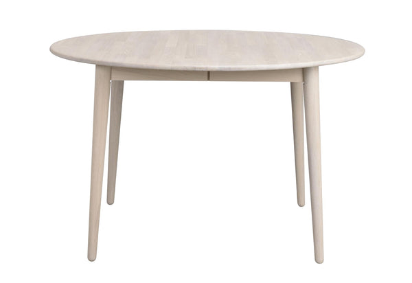 Runt matbord i ljust trä med fyra ben och minimalistisk design