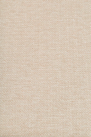 Beige vävd textil med naturlig struktur och diskret mönster, perfekt för heminredning och möbelklädsel