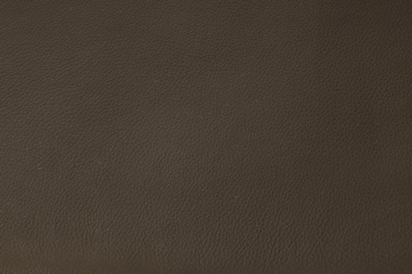 Mörkbrun konstläderstruktur med naturlig präglad yta och matt finish