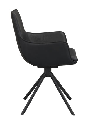 Svart stol med armstöd och fyra ben i metall, sidovy av modern matstol i konstläder