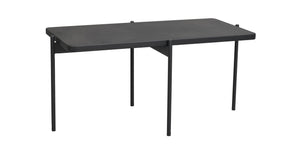 Svart matbord med rektangulär skiva och tre ben i modern skandinavisk design