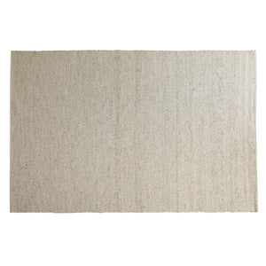 Beige handvävd jutematta med diagonalt strimmönster på vit bakgrund