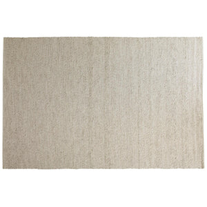 Beige handvävd jutematta med naturlig struktur och diagonala vävmönster