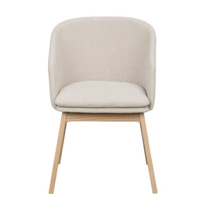 Beige stoppad matstol med träben i ljust trä, modern skandinavisk design