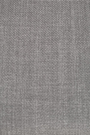 Grå vävd textil i närbild med strukturerad yta och naturliga toner