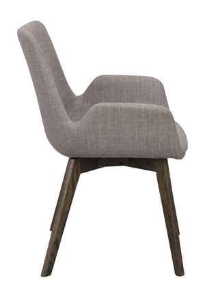 Grå stol med stoppad sits och rygg samt mörkbruna träben, sedd från sidan