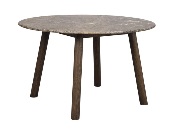 Runt soffbord med grå marmorskiva och mörka träben i modern skandinavisk design