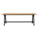 Matbord med ljus ektopp och svart metallunderrede i industriell stil