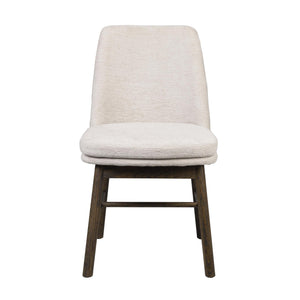 Vit stoppad matstol med träben i mörkbrun finish, framifrån fotograferad mot vit bakgrund