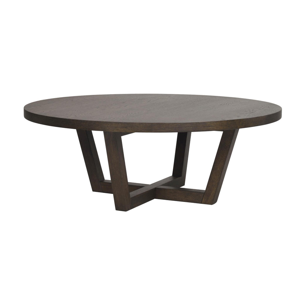 Runt soffbord i mörkbrun ek med korsformat underrede och modern design