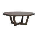 Runt soffbord i mörkbrun ek med korsformat underrede och modern design