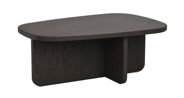 Ovalt soffbord i mörkbetsad ek med rundade kanter och massiv fotplatta i modern skandinavisk design