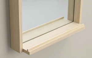 Fönsterbrädor i ljust trä med naturlig struktur och elegant profil för modern inredning