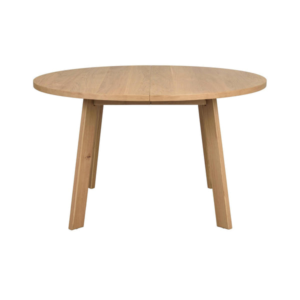 Runt matbord i ljust trä med utdragsfunktion och fyra snedställda ben i skandinavisk design