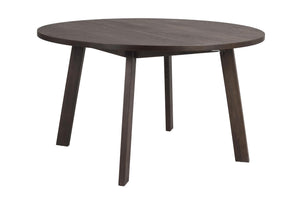 Runt matbord i mörkbrun ek med fyra sneda ben, modern skandinavisk design