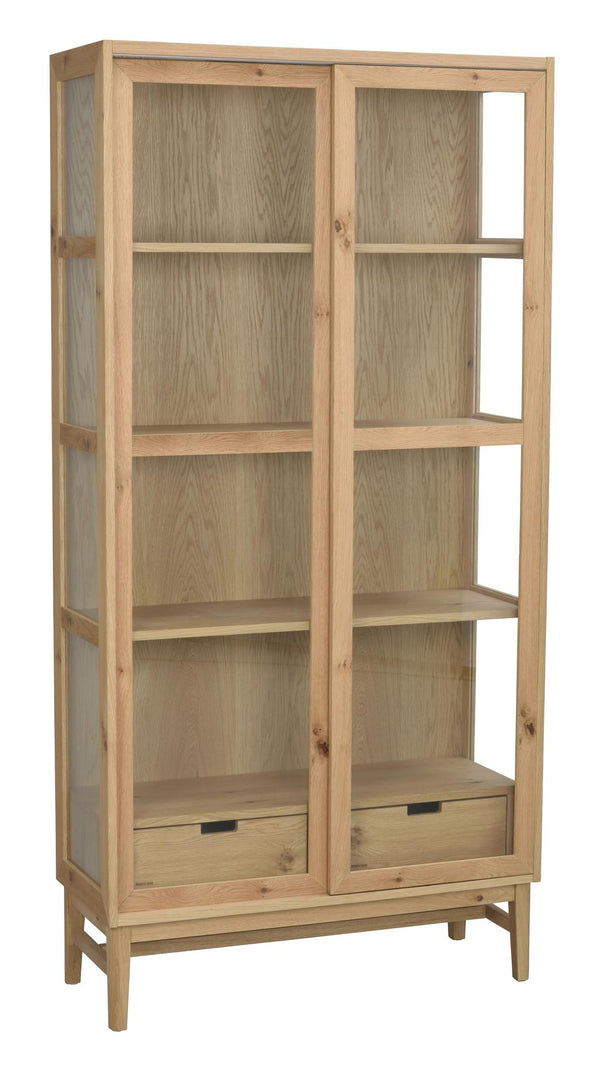 Vitrinskåp i ek med två dörrar, fyra hyllplan och två lådor på träben