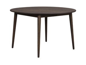 Runt matbord i mörkt trä med fyra ben i skandinavisk design