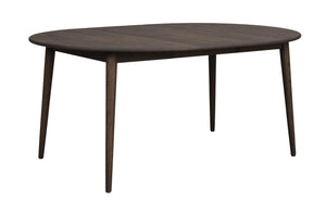 Oval matbord i mörkt trä med fyra ben i skandinavisk design