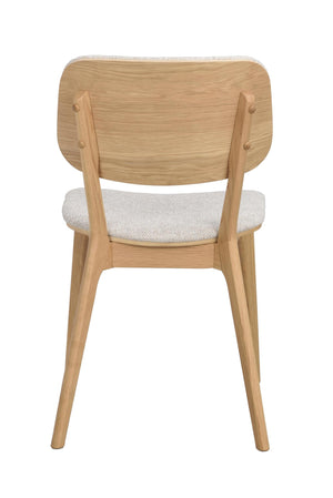 Matstol i ek med stoppad sits i ljusgrått tyg, vynd bakifrån