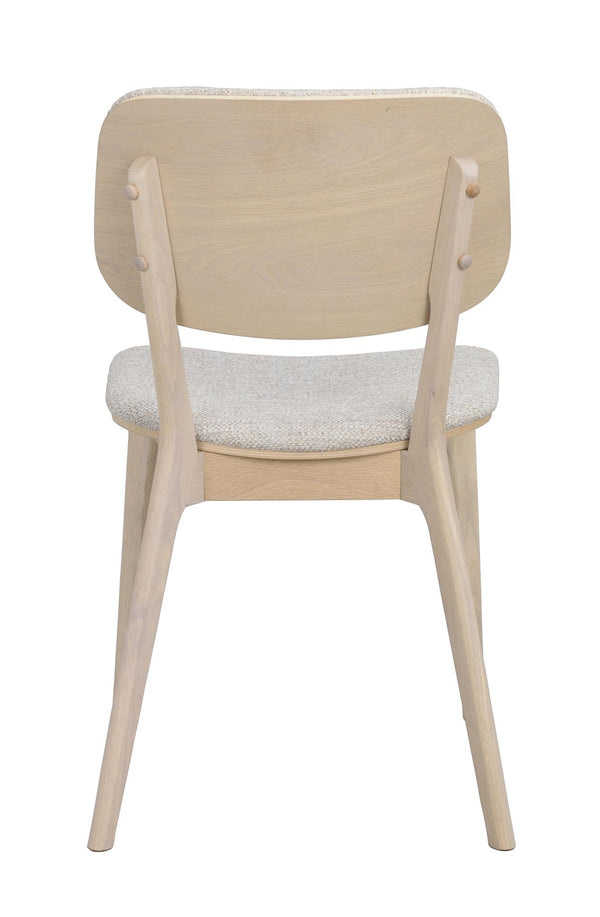 Stol i ljust trä med stoppad sits och böjd rygg, sedd bakifrån