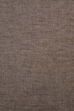 Närbild av beige-brunt tyg med grov vävd struktur, perfekt för möbelklädsel och inredning