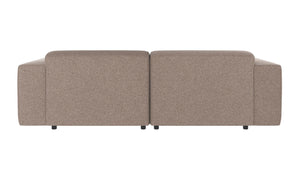 Beige tvåsitsig soffa med modulär design sedd bakifrån, med låga armstöd och svarta ben