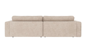 Beige tvåsitsig soffa med låg rygg och mjuka dynor, vy bakifrån