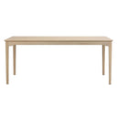 Matbord i ljust trä med raka ben och enkel skandinavisk design