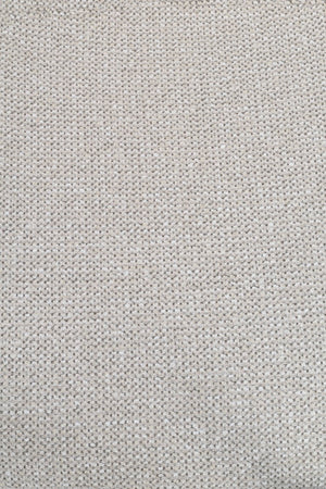 Ljusgrå tygtextur med diagonal vävning och naturliga spräckliga toner, närbild av textilmaterial