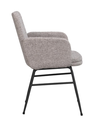 Grå stol med stoppad sits och rygg i bouclé-tyg på svarta metallben, sidovy