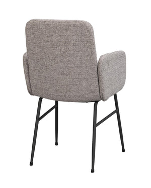 Grå stoppad stol med armstöd och svarta metallben, sedd bakifrån