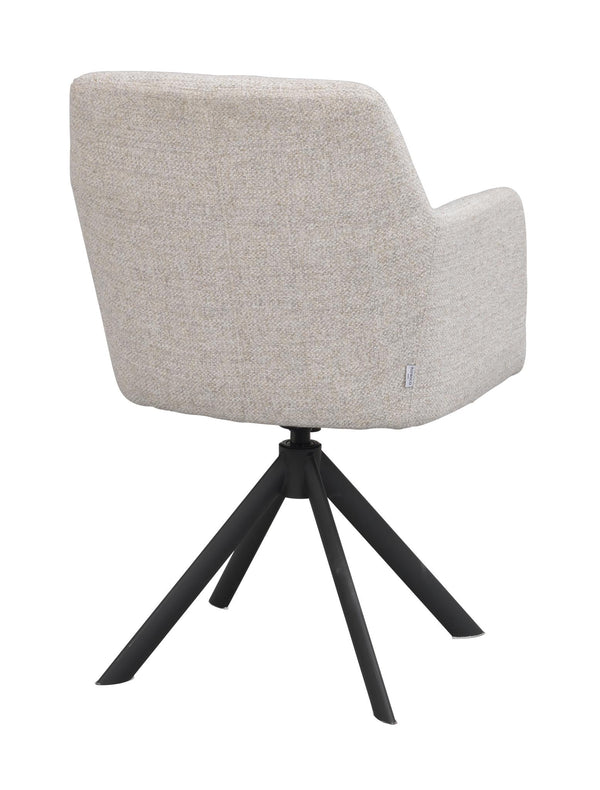 Beige stopperad stol med svart metallstativ och svängbar funktion, sett från baksidan