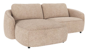 Beige bouclésofa med schäslong i modern design med mjuka rundade former