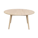 Runt soffbord i ljust trä med tre ben i skandinavisk design