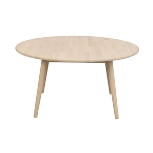 Runt soffbord i ljust trä med tre ben i skandinavisk design
