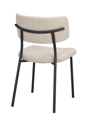 Matstol med beige klädsel och svart metallstativ, sedd bakifrån