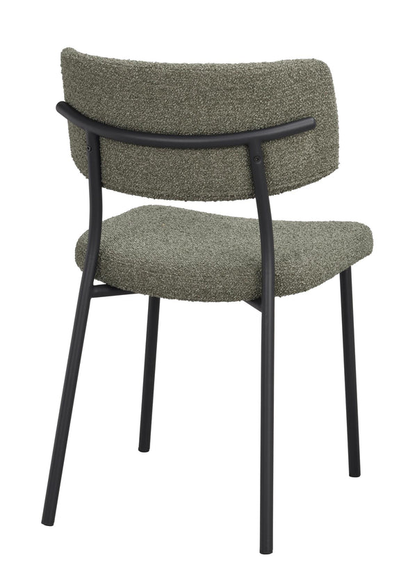Grön stol med svart metallstativ, stoppad sits och rygg i bouclé-tyg, vy bakifrån