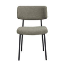 Grön stol med teddy-tyg och svarta metallben, frontvy mot vit bakgrund