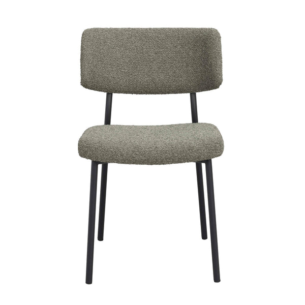 Grön stol med teddy-tyg och svarta metallben, frontvy mot vit bakgrund