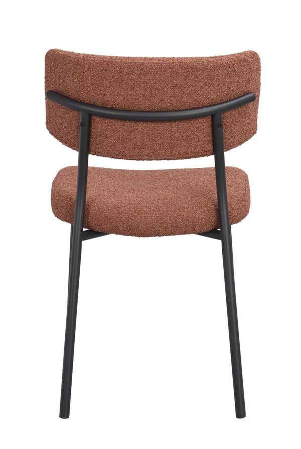 Matstol med rostbrun teddyfleece-klädsel och svart metallstomme, sedd bakifrån