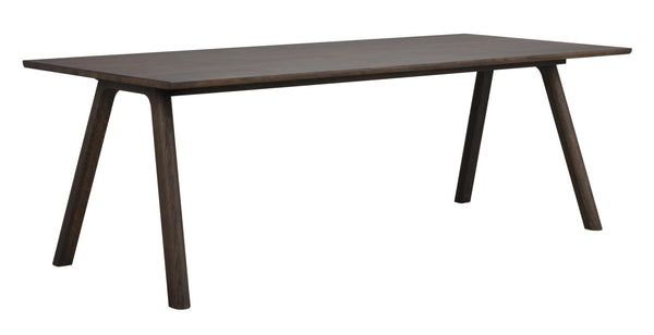 Mörkbrun träbord med rektangulär skiva och sneda ben i modern skandinavisk design