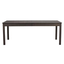Mörkbrun matbord i trä med raka ben och utdragsfunktion, framifrån fotograferat mot vit bakgrund