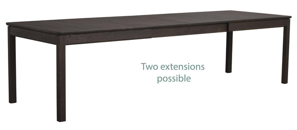 Förlängningsbart matbord i mörkbrun finish med två extra iläggsskivor, modern design