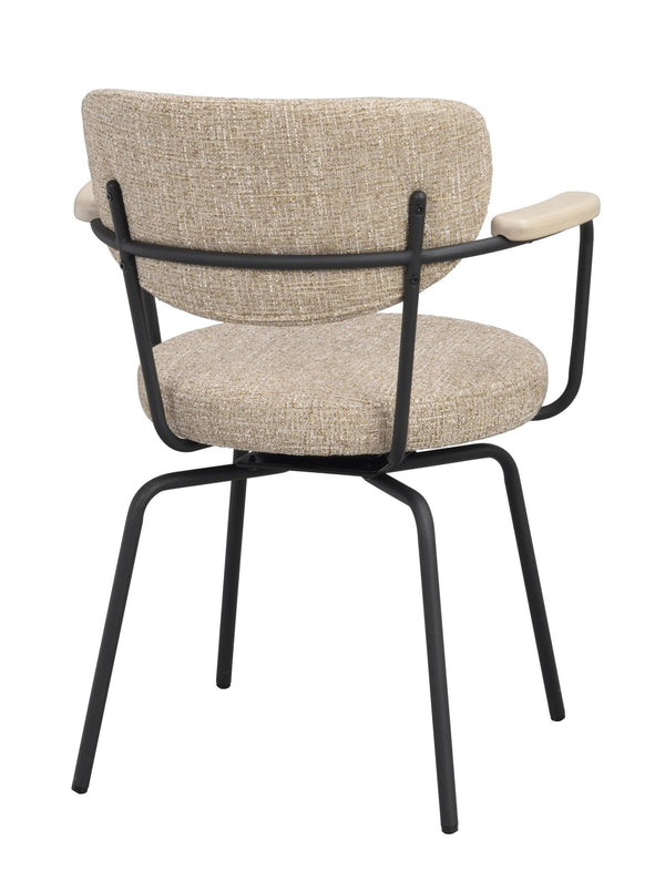 Matstol med beige klädsel, svart metallstomme och ljusa armstöd, sedd bakifrån